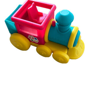 Kids Toy CoComelon colorful yellow pink blue musical train. Plays music